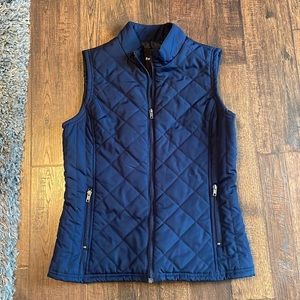 Never worn size small navy vest